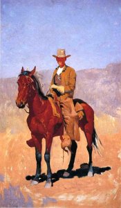 Mounted Cowboy In Chaps With Race Horse